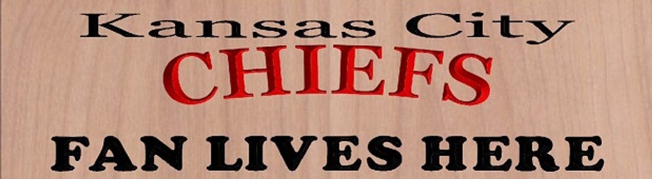 Kansas City Chiefs fan sign on wood.