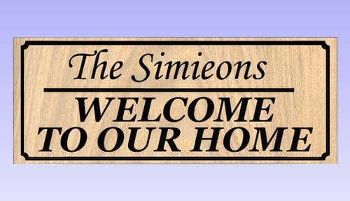 Welcome sign with family name on wood.